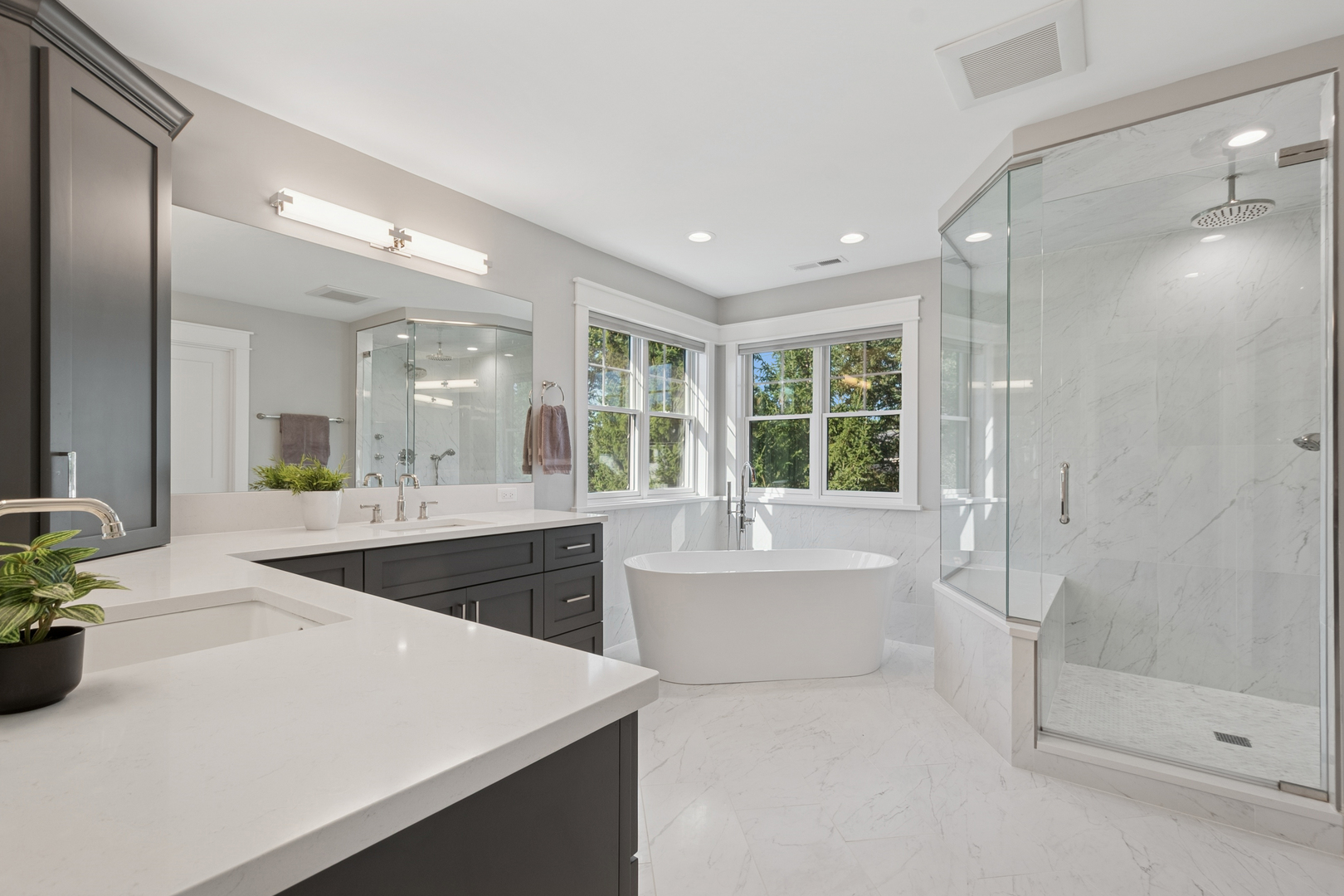 928 Hunter Road Glenview, IL 60025 - Photo 21 of 40 a spacious bathroom with a tub sink and shower
