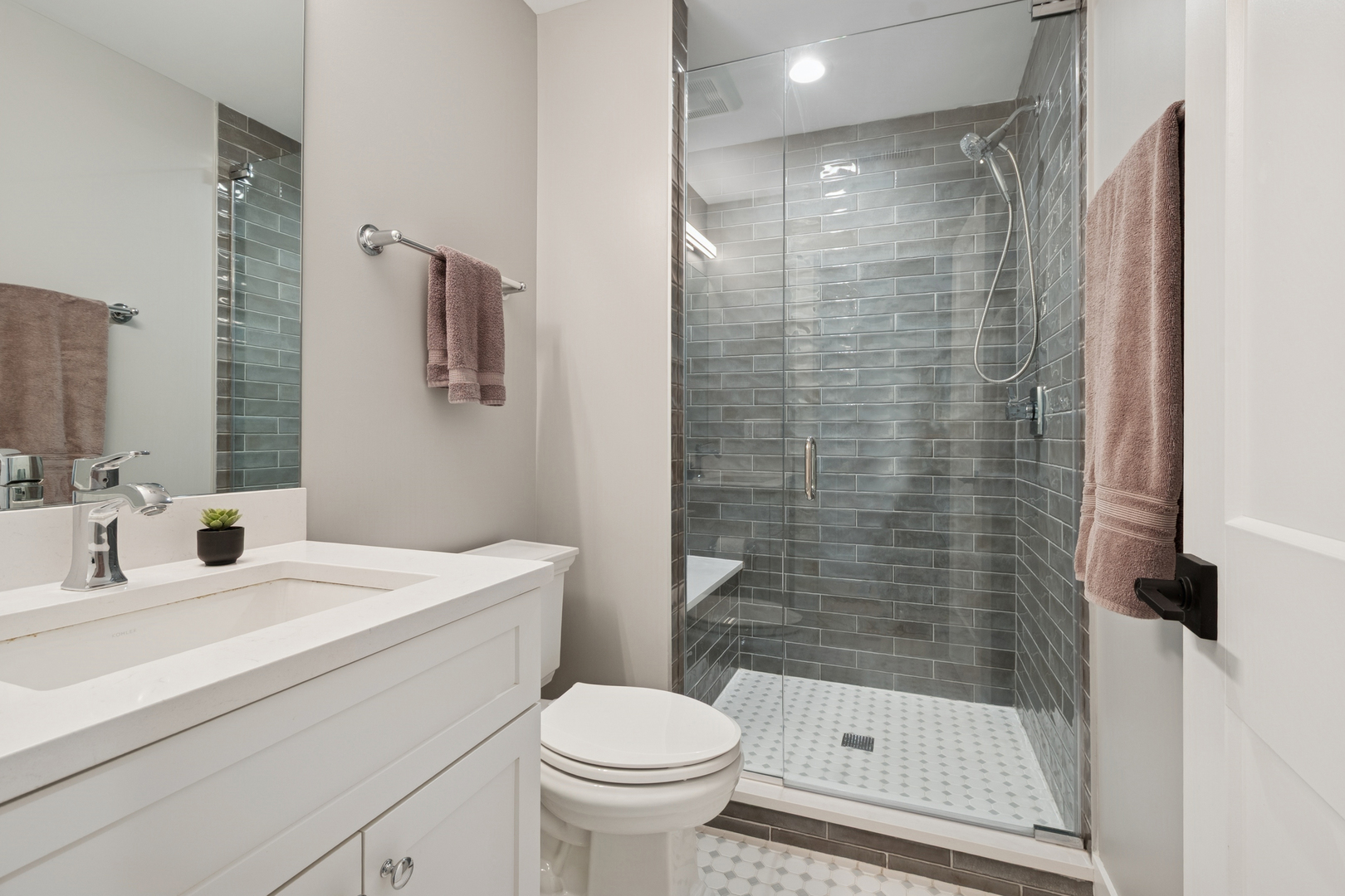 928 Hunter Road Glenview, IL 60025 - Photo 28 of 40 a bathroom with a sink toilet and shower