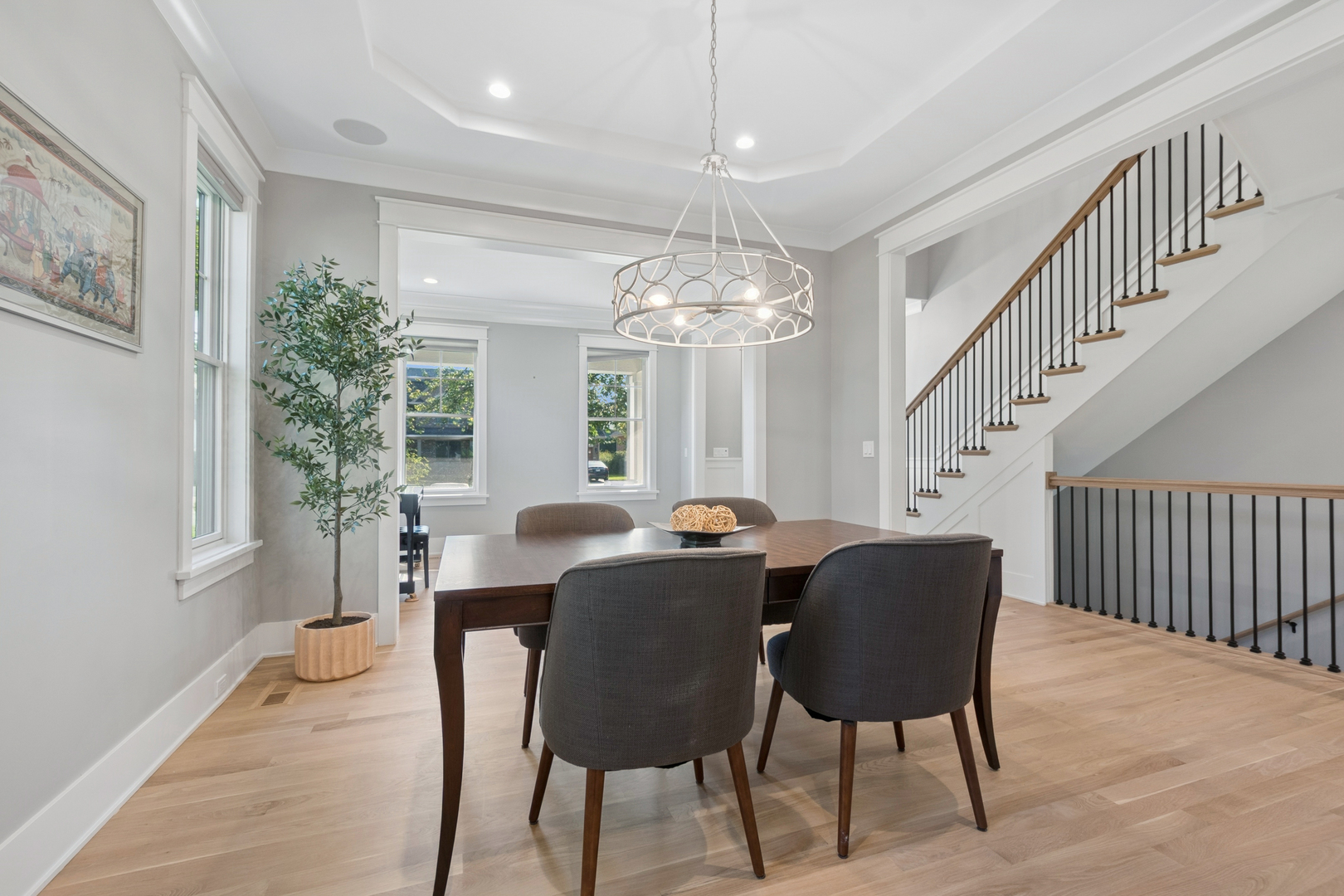 928 Hunter Road Glenview, IL 60025 - Photo 8 of 40 a view of a dining room with furniture and chandelier