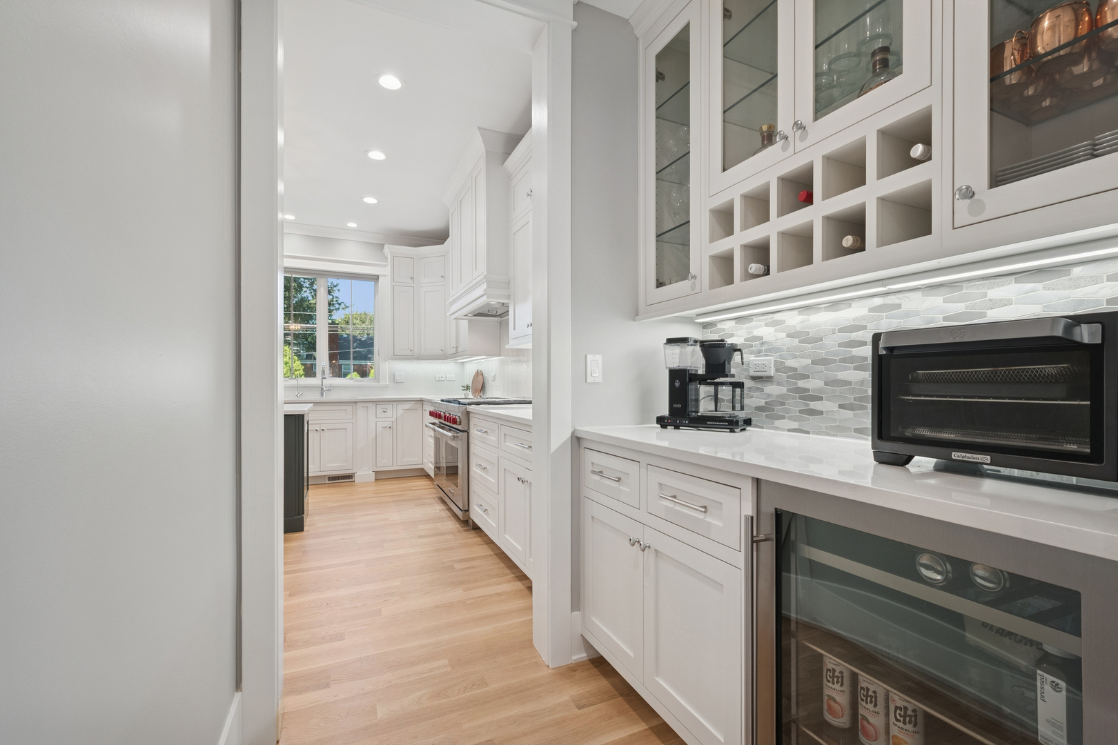 928 Hunter Road Glenview, IL 60025 - Photo 10 of 40 a kitchen with a sink stainless steel appliances and cabinets