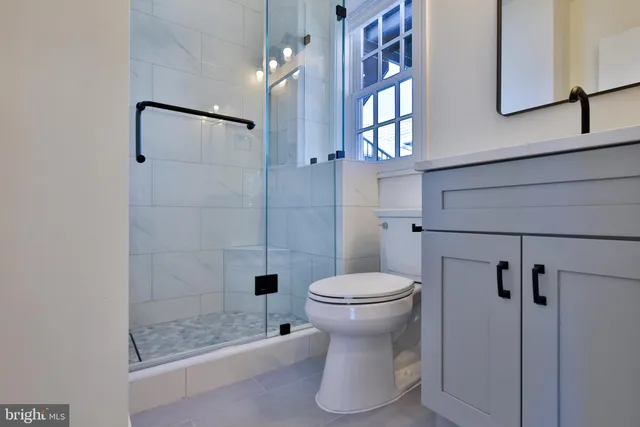 a view of a hallway with washer and dryer