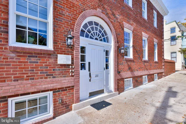 a view of a street with cars