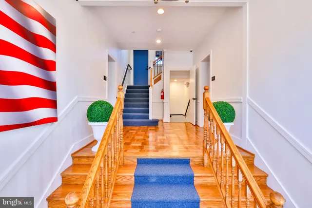 a view of entryway with wooden floor