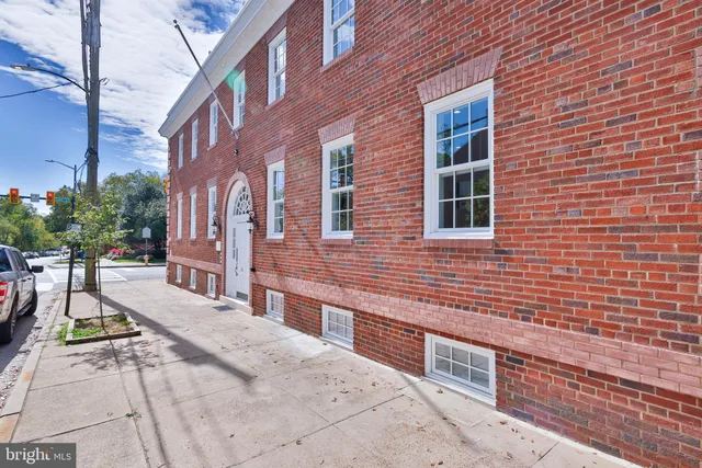a picture of a bathroom with a shower