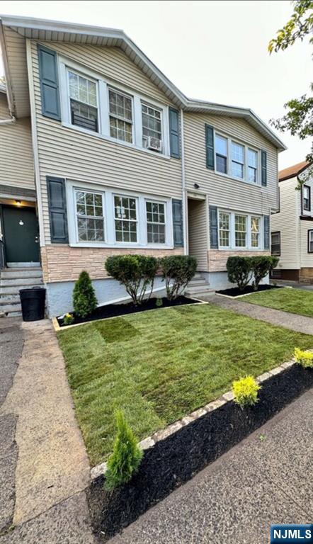 48 Maple Avenue, Unit 2 Montclair, NJ 07042 - Photo 7 of 7 a swimming pool with outdoor seating and yard