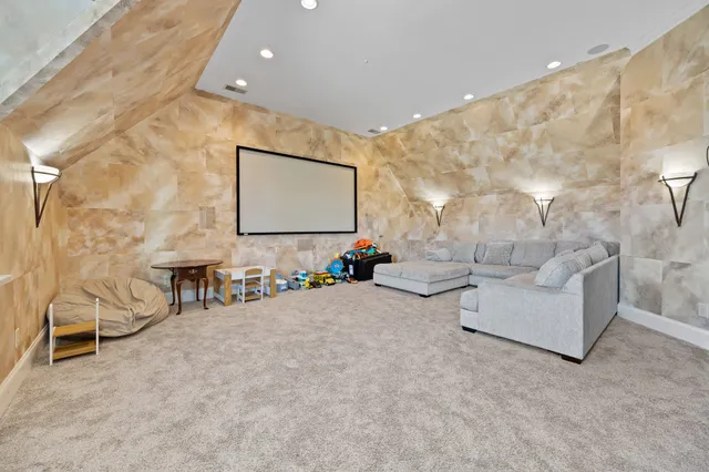 a spacious bathroom with a double vanity sink and a mirror