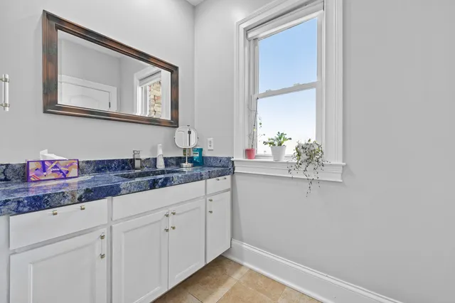a living room with furniture and window