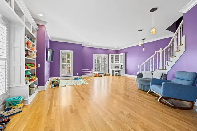 a bathroom with a bathtub and a window