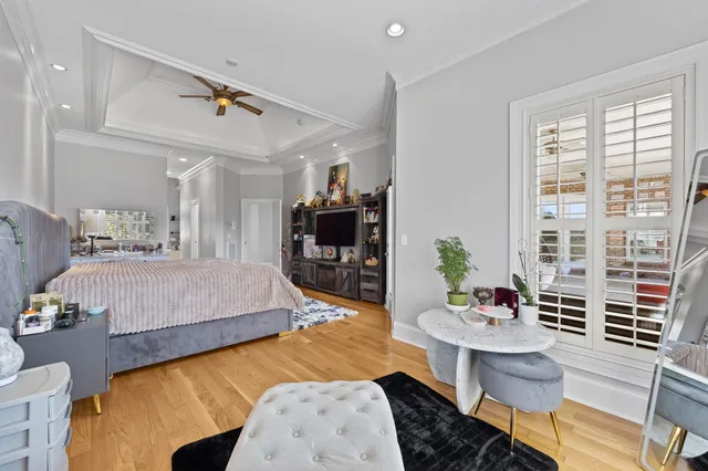 a view of a house with backyard sitting area and garden