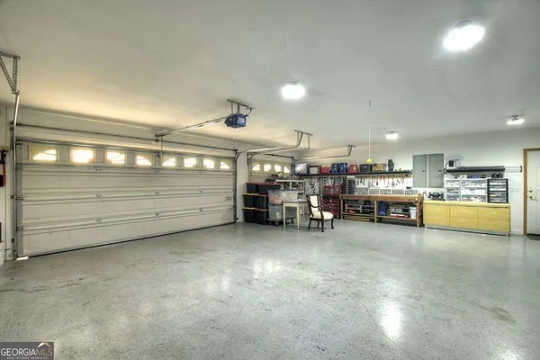 a view of a livingroom with furniture