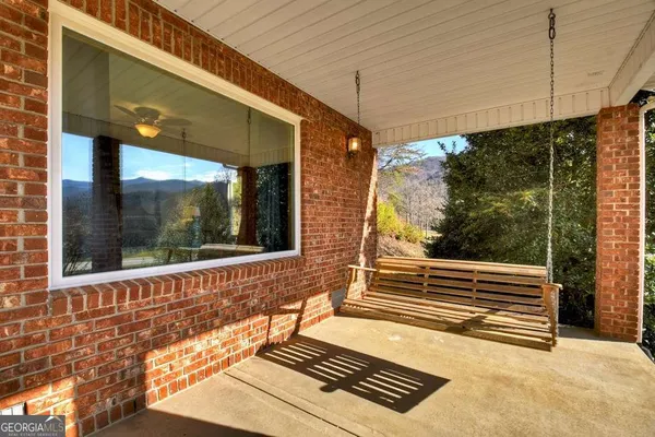 a view of a door and a window