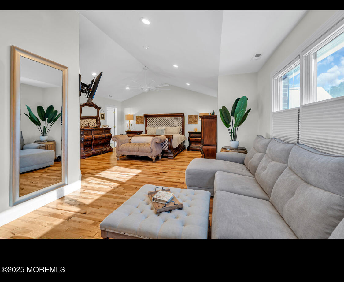 9 Mehar Court Jackson, NJ 08527 - Photo 17 of 40 a living room with furniture and a flat screen tv