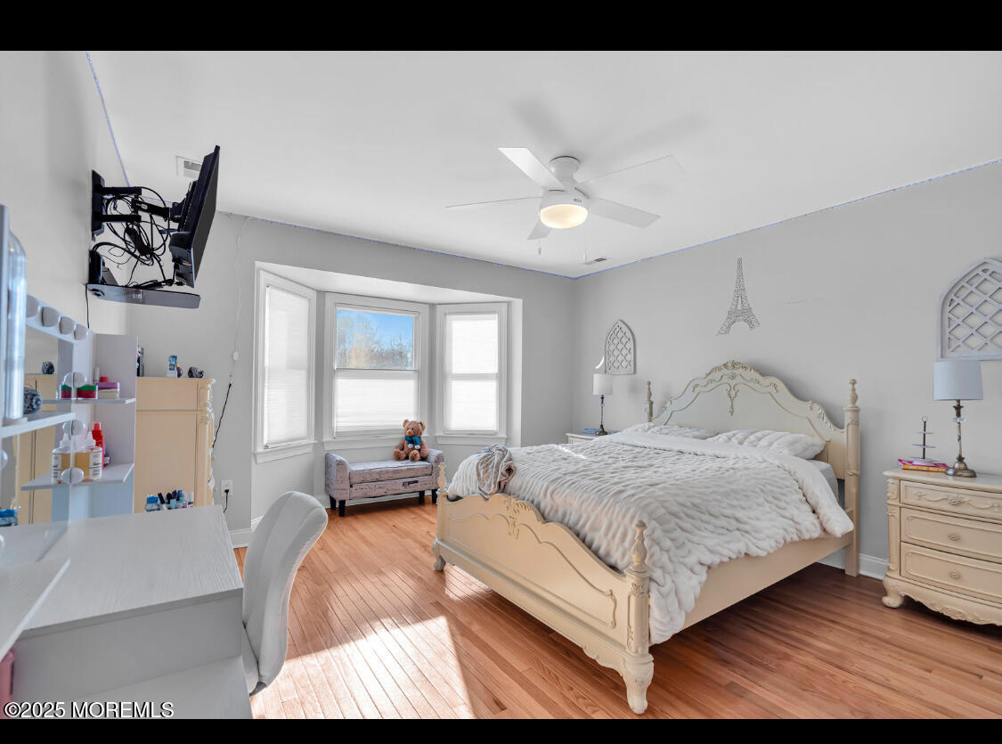 9 Mehar Court Jackson, NJ 08527 - Photo 18 of 40 a bedroom with a bed and window