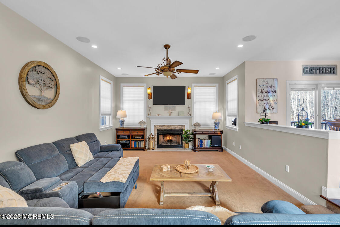 9 Mehar Court Jackson, NJ 08527 - Photo 3 of 40 a living room with furniture and a fireplace