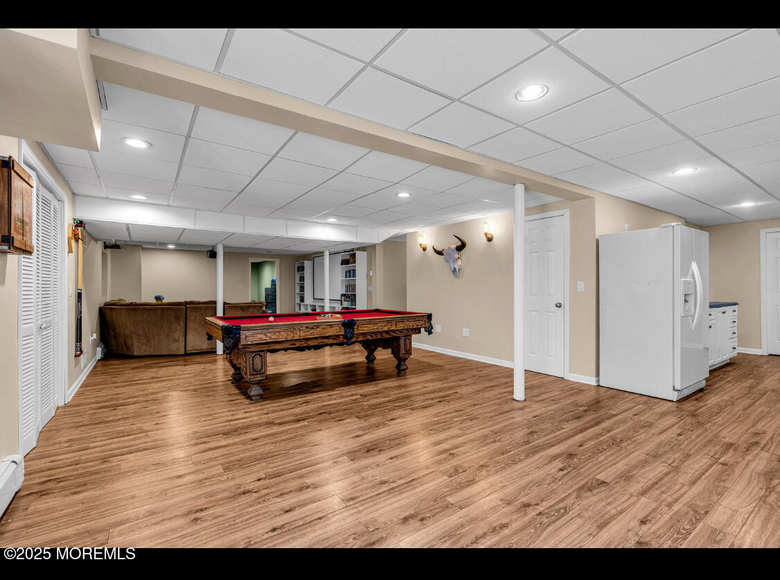 9 Mehar Court Jackson, NJ 08527 - Photo 31 of 40 a room with furniture and a wooden floor