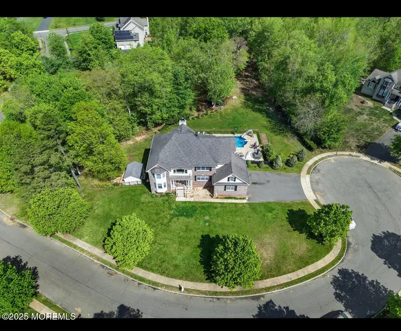 a view of a garden with a fountain