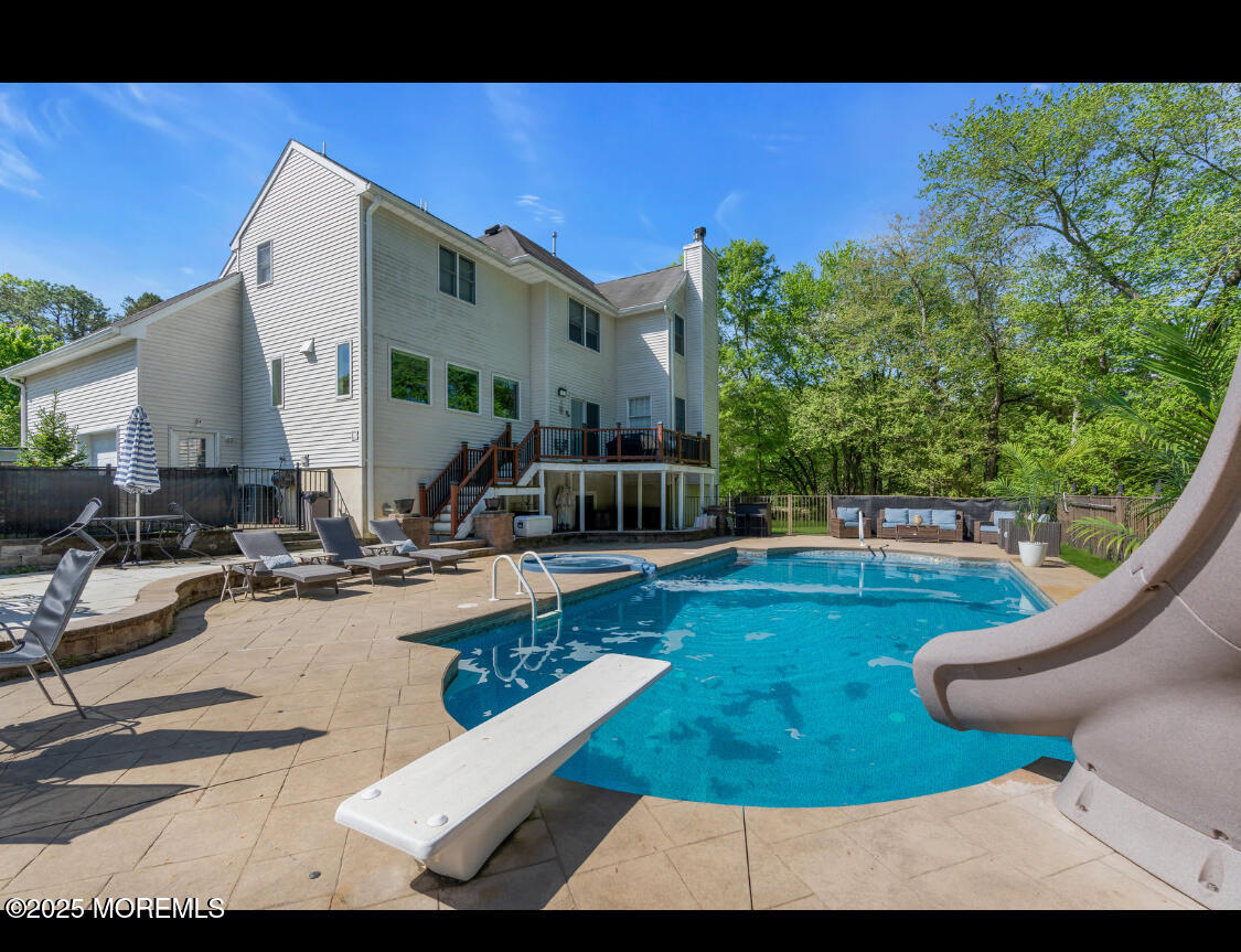 9 Mehar Court Jackson, NJ 08527 - Photo 35 of 40 a view of a swimming pool with sitting area
