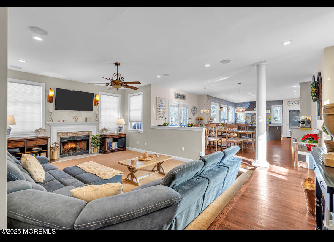 9 Mehar Court Jackson, NJ 08527 - Photo 4 of 40 a living room with furniture and a flat screen tv