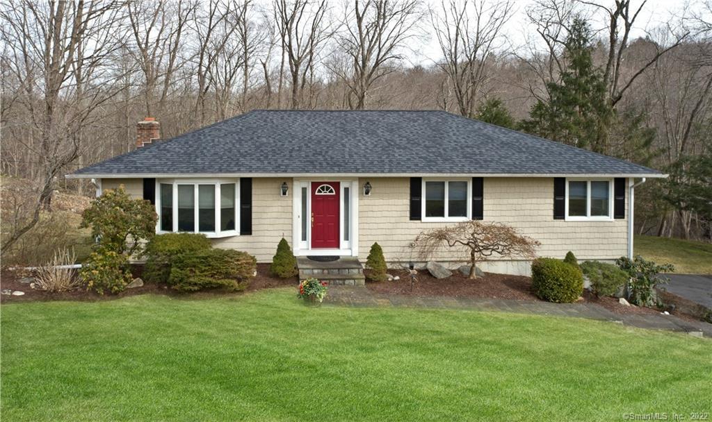 5 Broadview Road Brookfield, CT 06804 - Photo 1 of 1 a backyard of a house with table and chairs