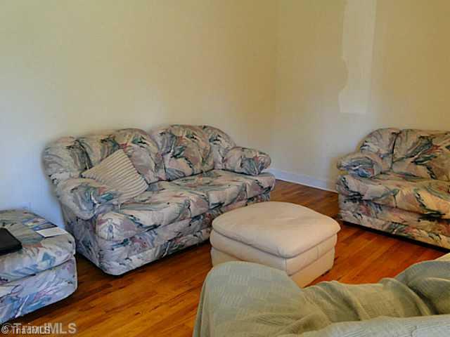209 Hampton Drive High Point, NC 27265 - Photo 2 of 14 Living Room. Front living room with wood floors.