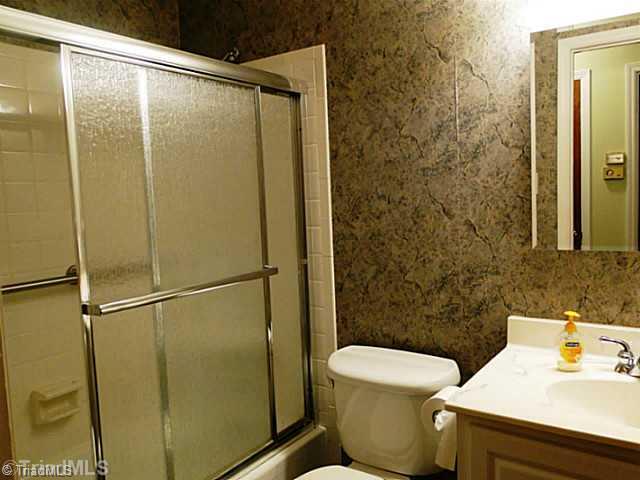 209 Hampton Drive High Point, NC 27265 - Photo 12 of 14 Other Bath. Hall bath with ceramic tub surround.
