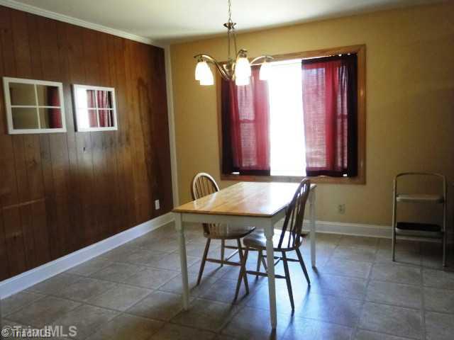 209 Hampton Drive High Point, NC 27265 - Photo 5 of 14 Dining Room. View of kitchen with dining area and bay window. Can be breakfast room or dining area.