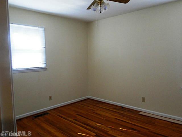 209 Hampton Drive High Point, NC 27265 - Photo 10 of 14 Master Bedroom. Master with wood floors and ceiling fans