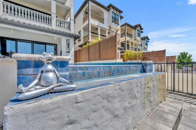 an aerial view of a house with a lake view
