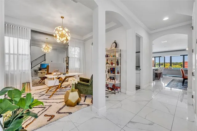 a living room with furniture floor and a window