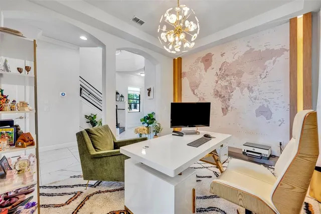 a view of a balcony with chair and table