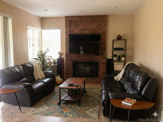 a bedroom with a bed and a lamp