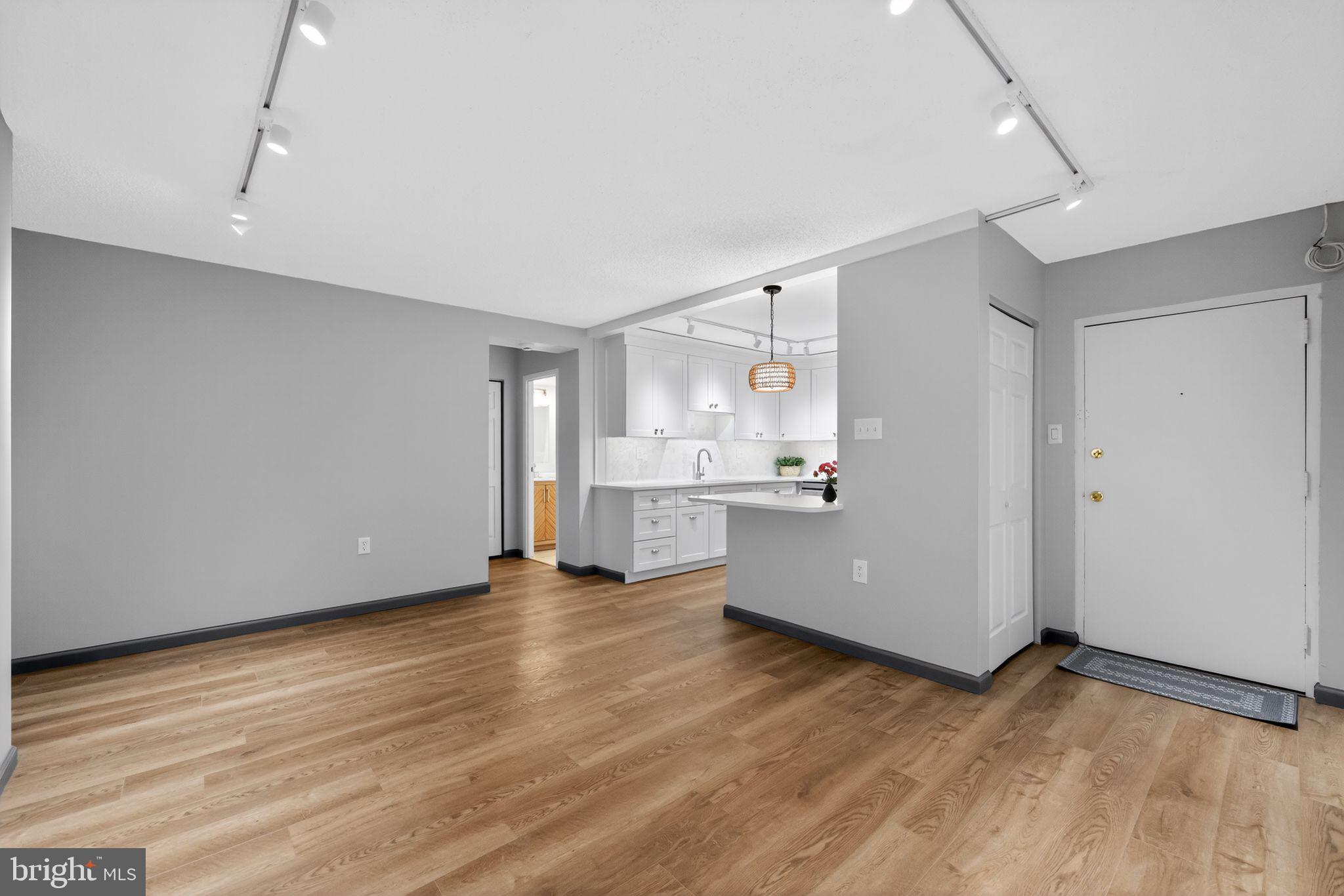 400 Glendale Road, Unit G33 Havertown, PA 19083 - Photo 11 of 26 a view of a kitchen with wooden floor and electronic appliances