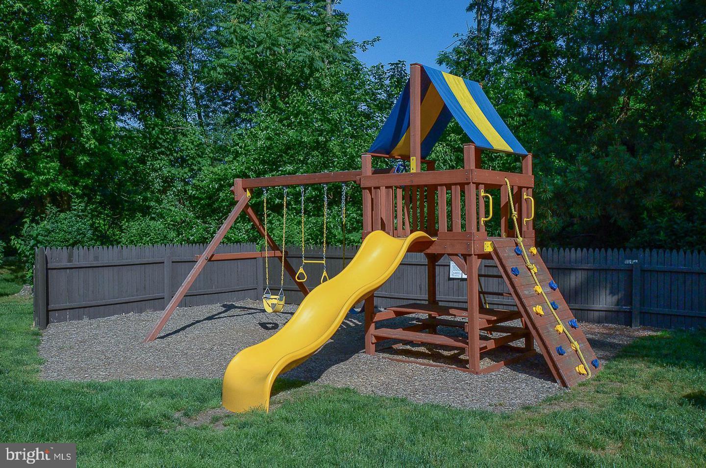 400 Glendale Road, Unit G33 Havertown, PA 19083 - Photo 23 of 26 a view of swimming pool with a backyard and slide