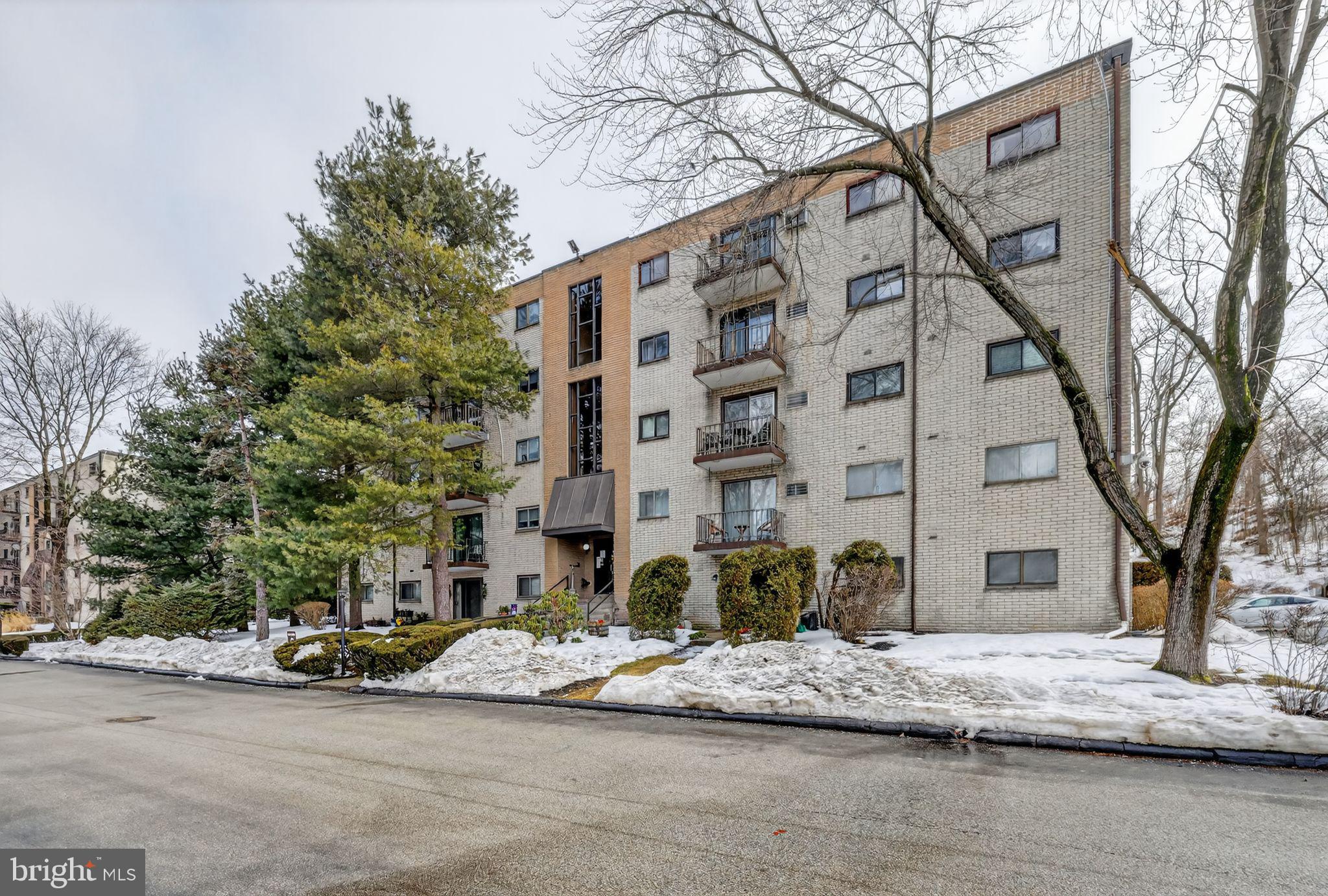 400 Glendale Road, Unit G33 Havertown, PA 19083 - Photo 24 of 26 a view of a street with a building in the background