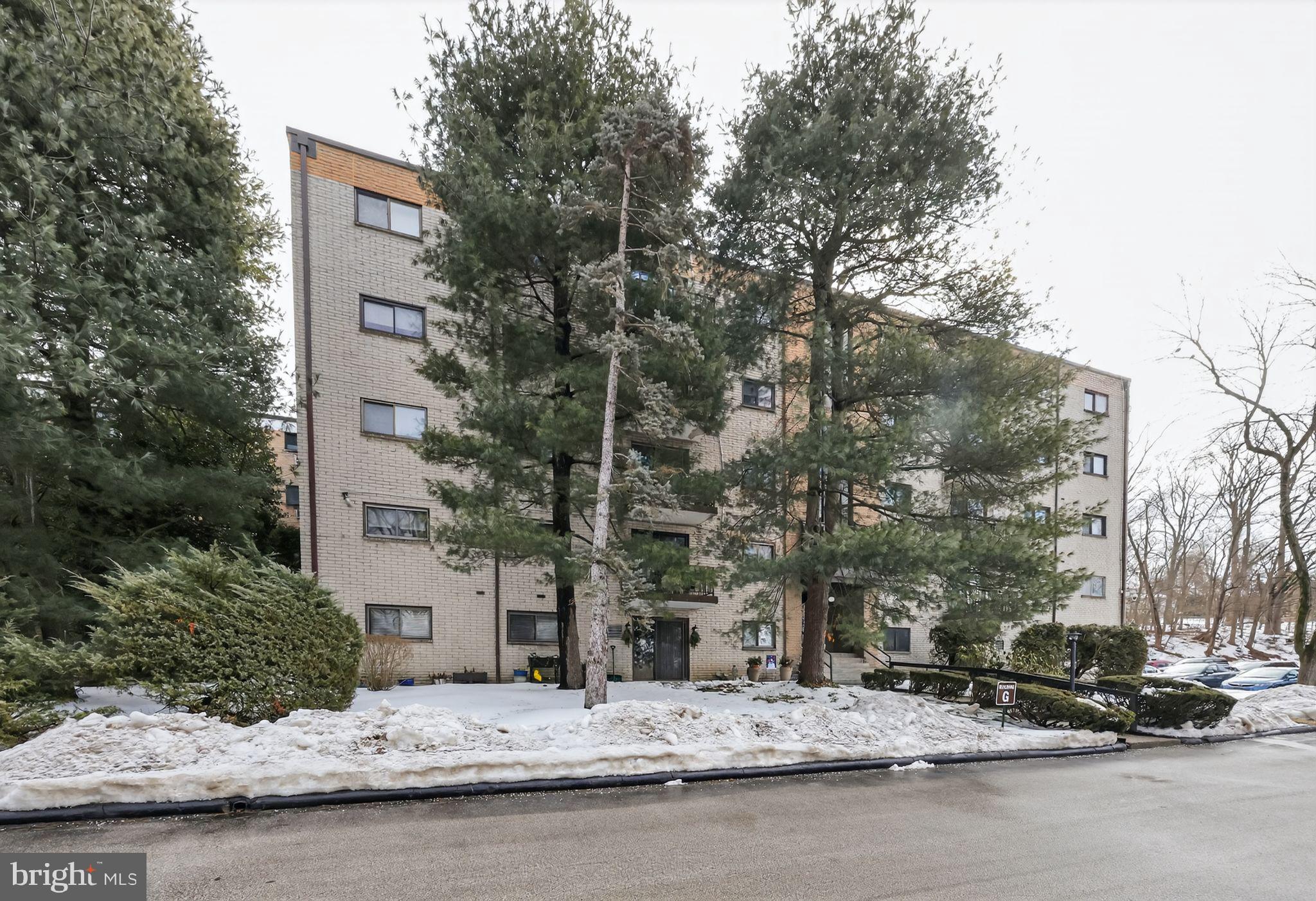 400 Glendale Road, Unit G33 Havertown, PA 19083 - Photo 25 of 26 a car parked on the side of a street