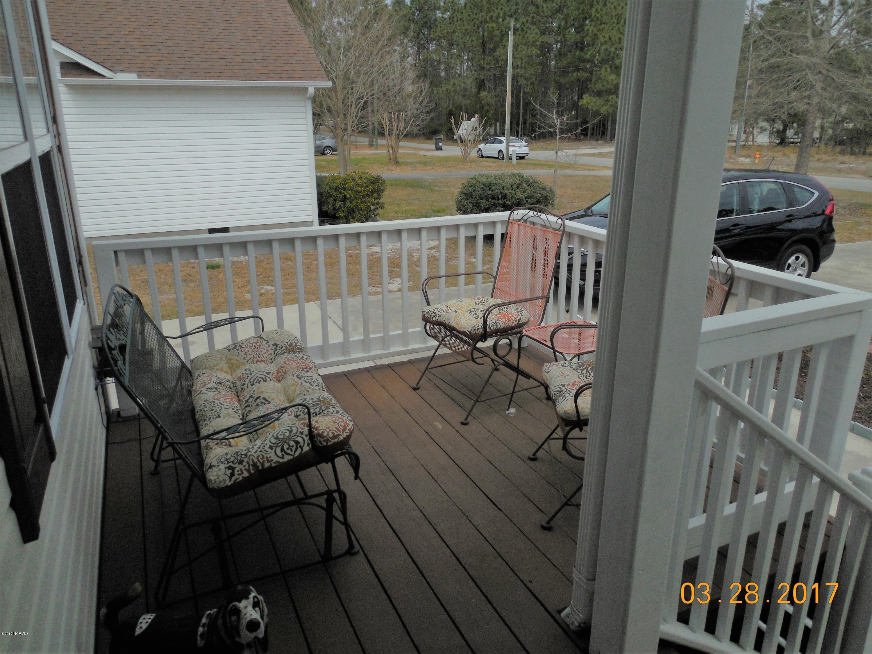 125 Cedar Road Southport, NC 28461 - Photo 4 of 18 125 Ceddar Front porch