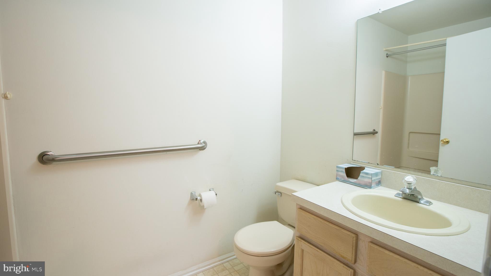 1403 Squirrel Road Marlton, NJ 08053 - Photo 14 of 21 a bathroom with a sink toilet and a mirror