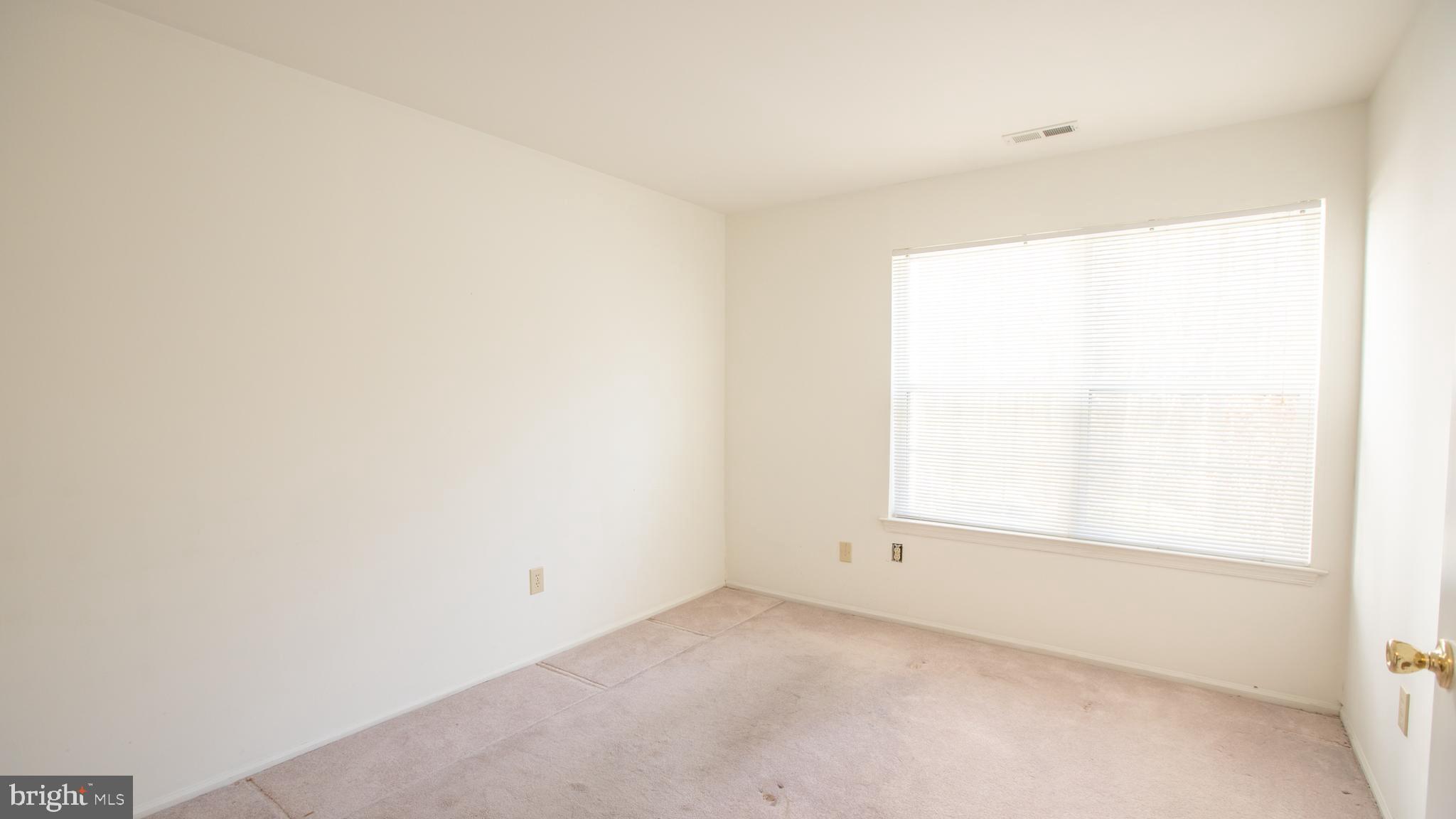 1403 Squirrel Road Marlton, NJ 08053 - Photo 16 of 21 an empty room with a window