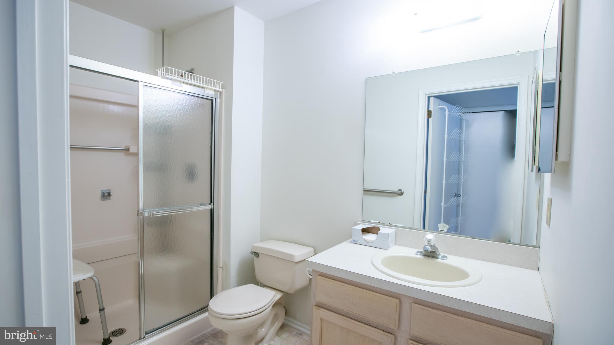 1403 Squirrel Road Marlton, NJ 08053 - Photo 19 of 21 a bathroom with a sink toilet and shower