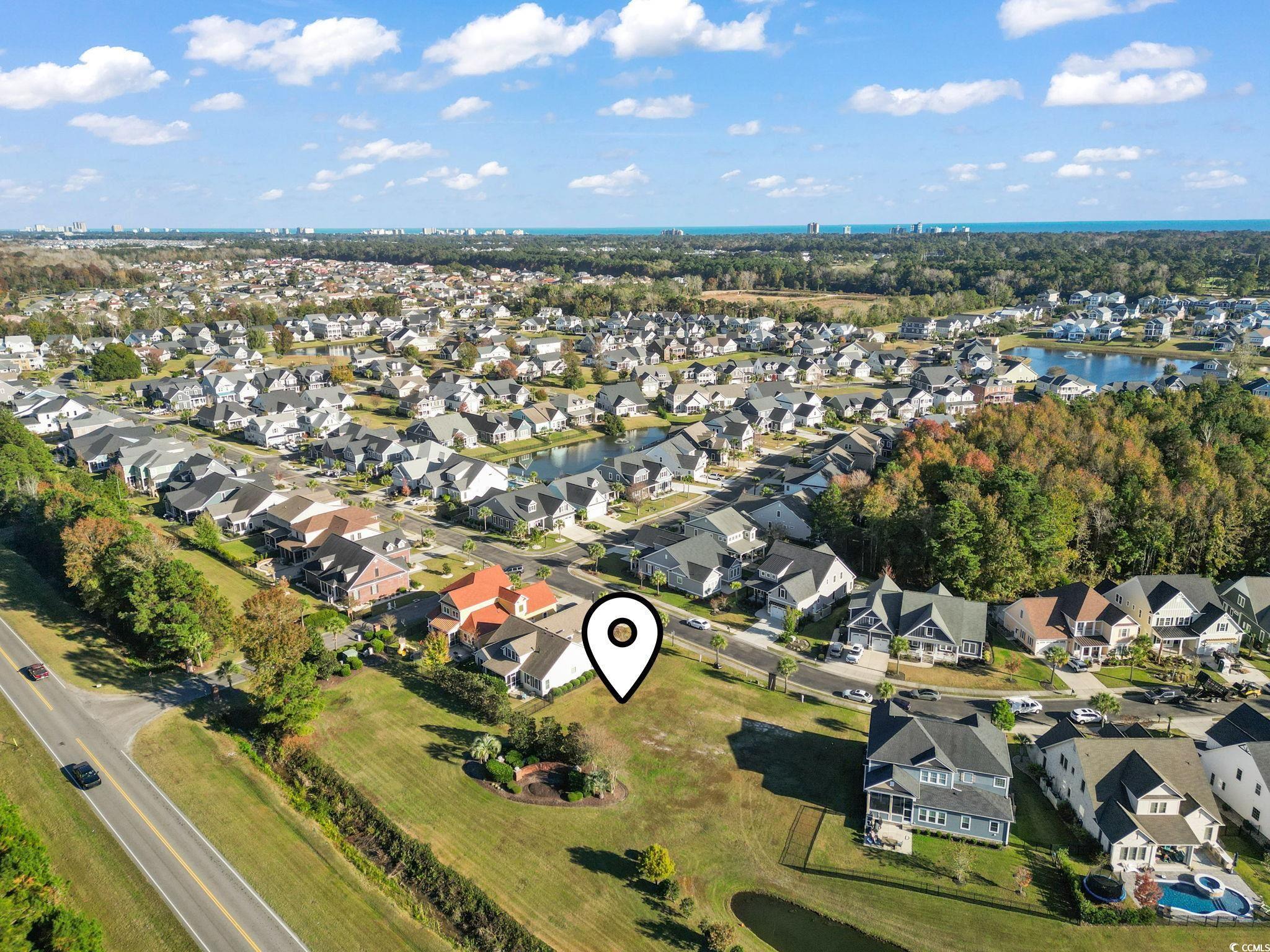 1103 East Isle Of Palms Avenue Myrtle Beach, SC 29579 - Photo 14 of 15 Aerial overview of property's location featuring nearby suburban area