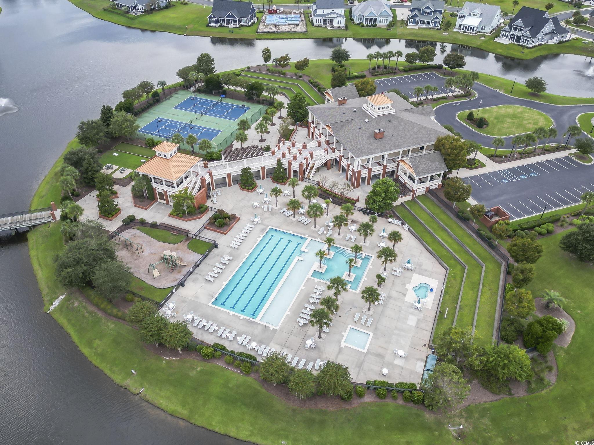1103 East Isle Of Palms Avenue Myrtle Beach, SC 29579 - Photo 3 of 15 Bird's eye view of a large body of water and a pool