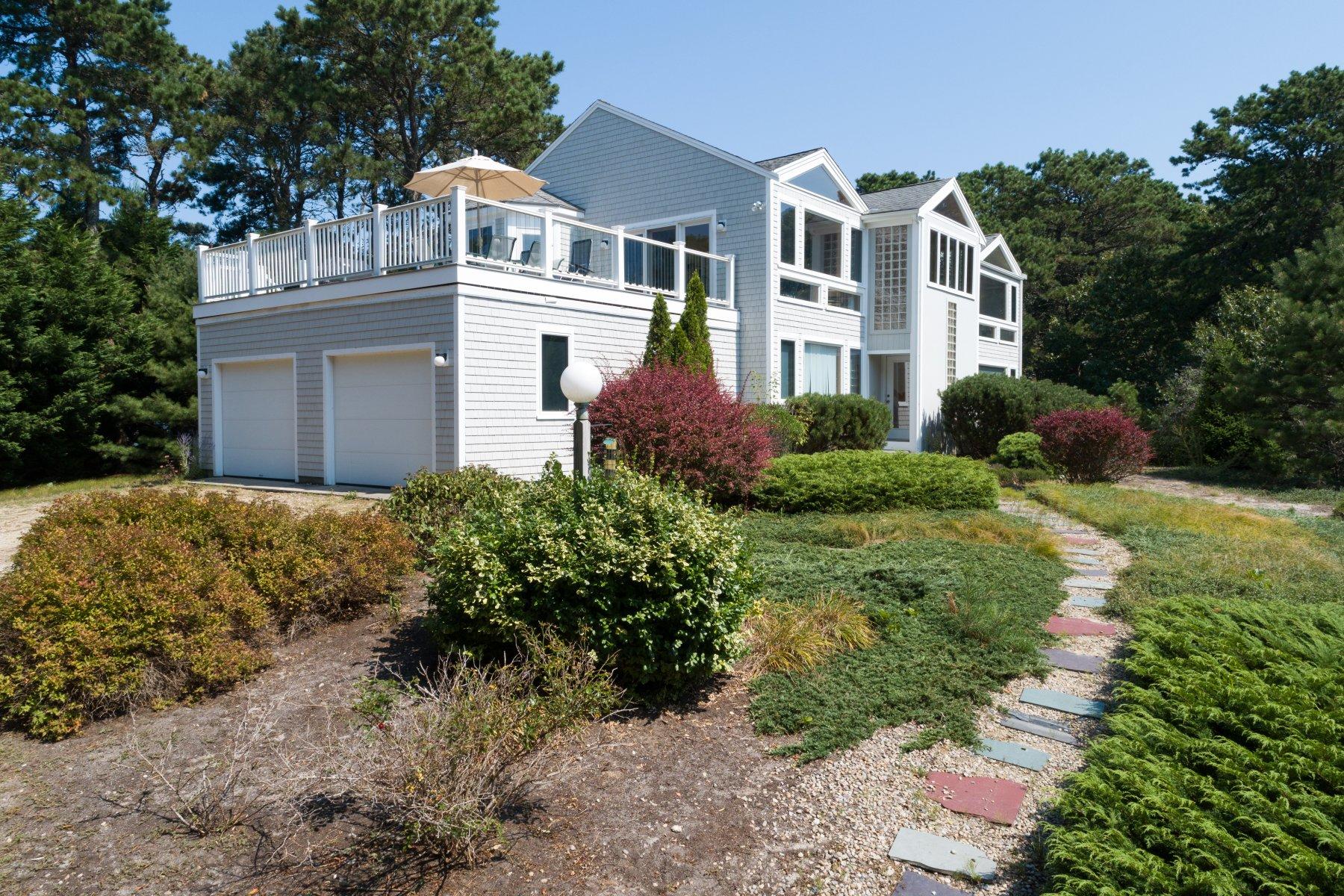 20 South Chatham Road Harwich, MA 02645 - Photo 1 of 35 a front view of a house with a yard