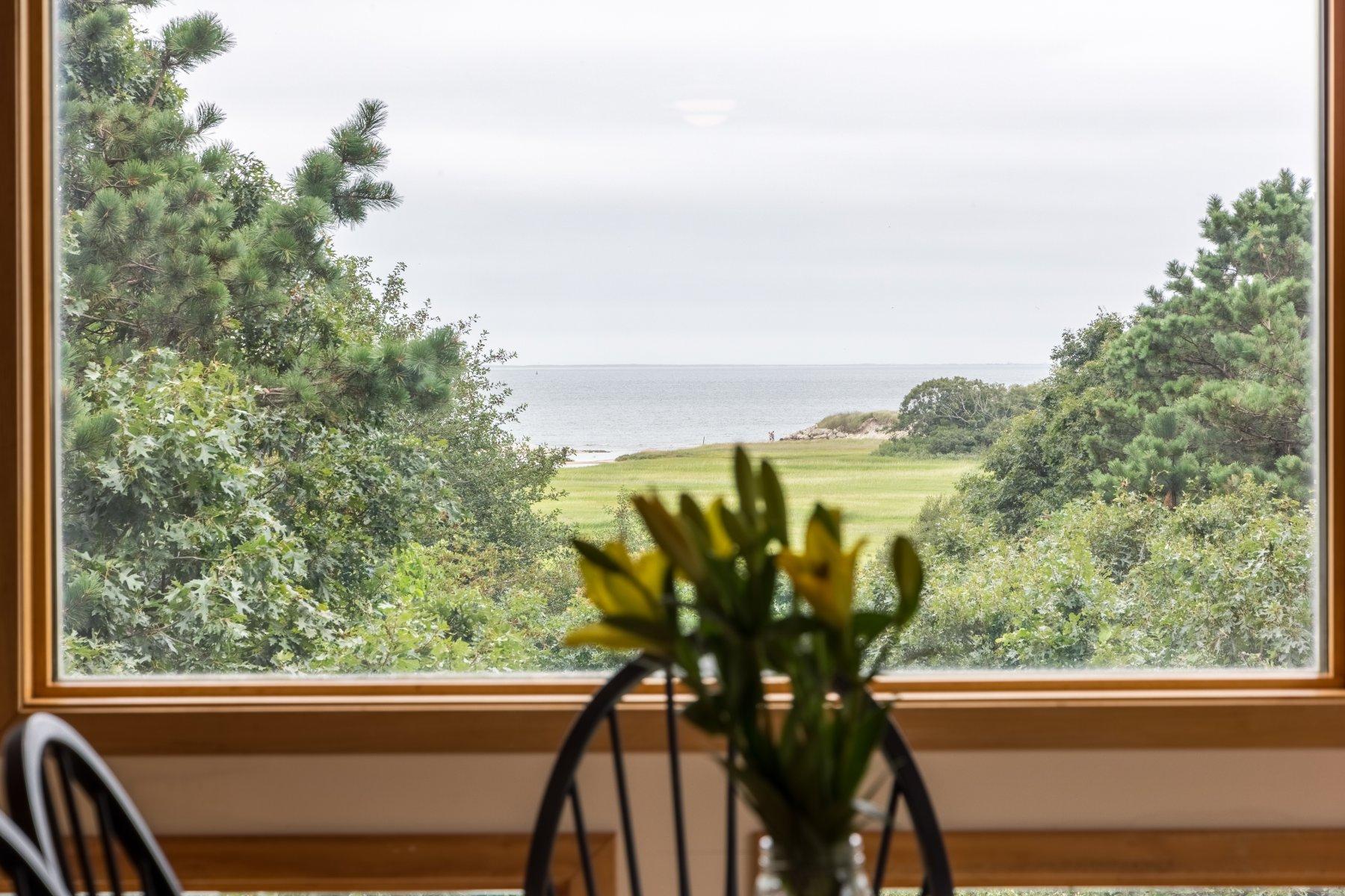 20 South Chatham Road Harwich, MA 02645 - Photo 10 of 35 a view of a balcony with chairs and a table
