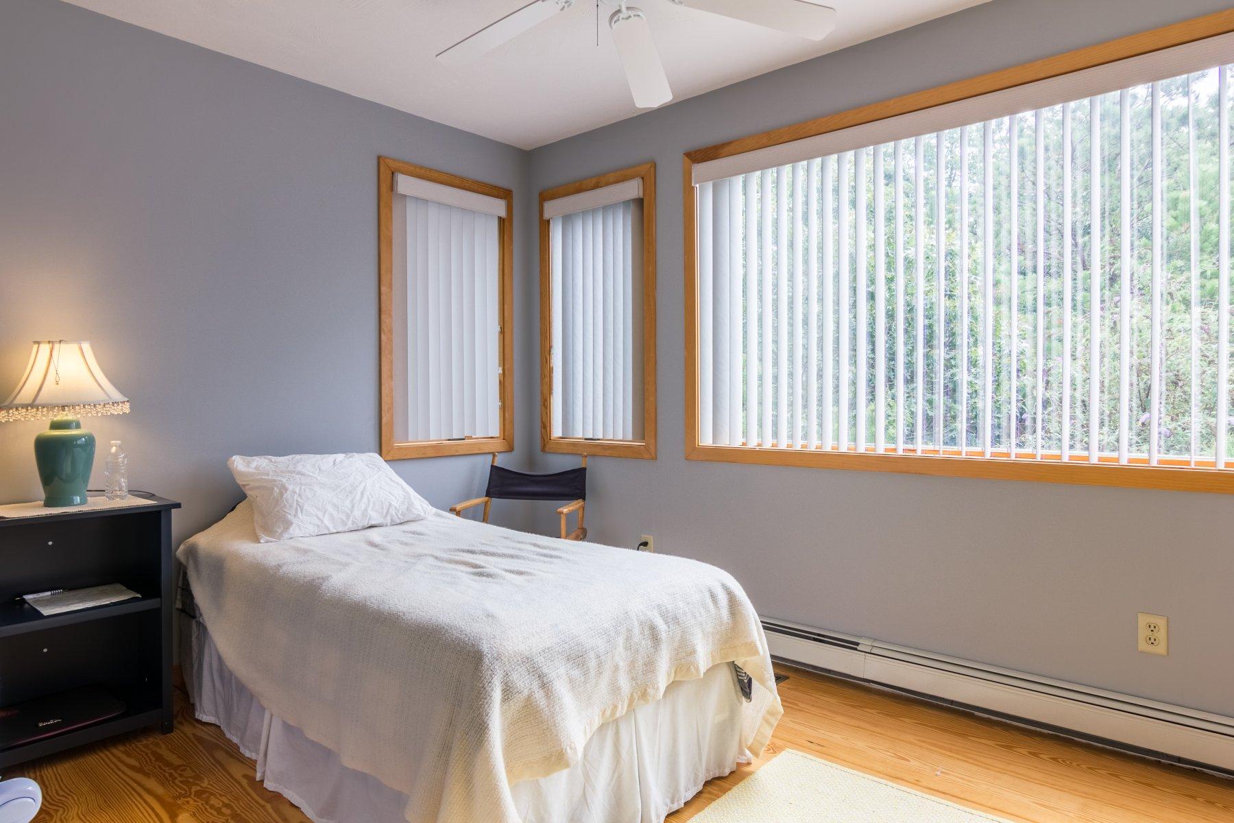 20 South Chatham Road Harwich, MA 02645 - Photo 21 of 35 a bedroom with a bed and a window