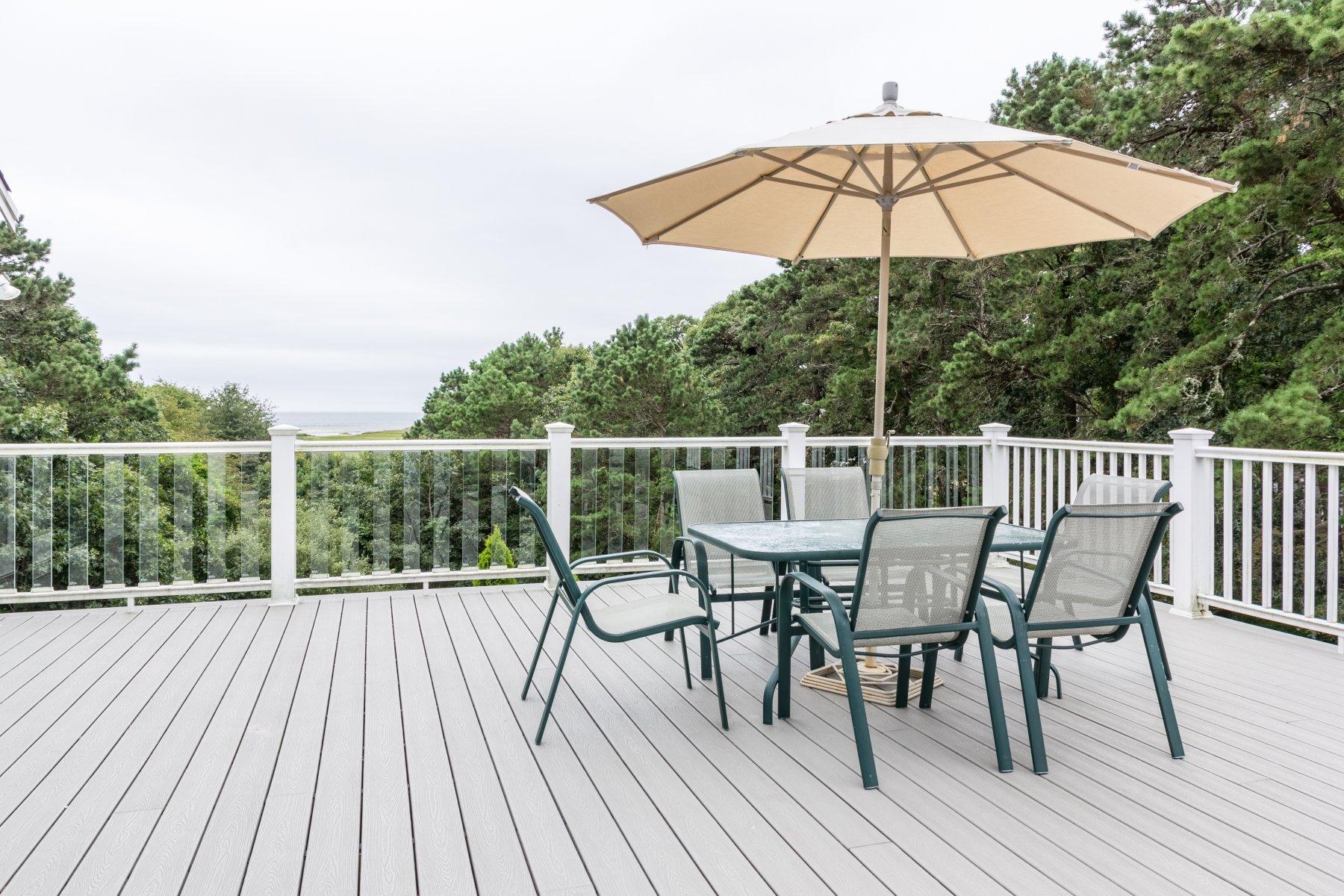 20 South Chatham Road Harwich, MA 02645 - Photo 25 of 35 a view of a roof deck with table and chairs