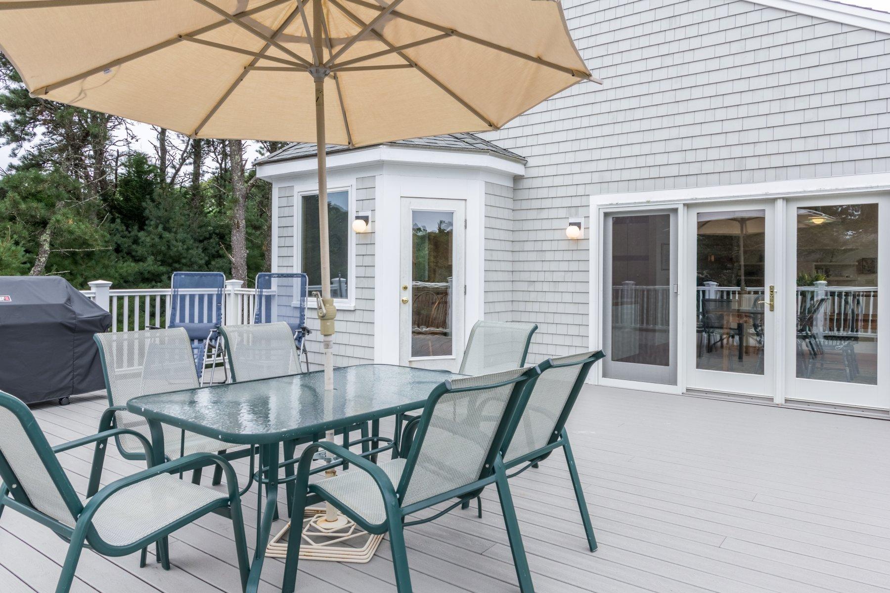 20 South Chatham Road Harwich, MA 02645 - Photo 26 of 35 a view of a chair and table on the deck