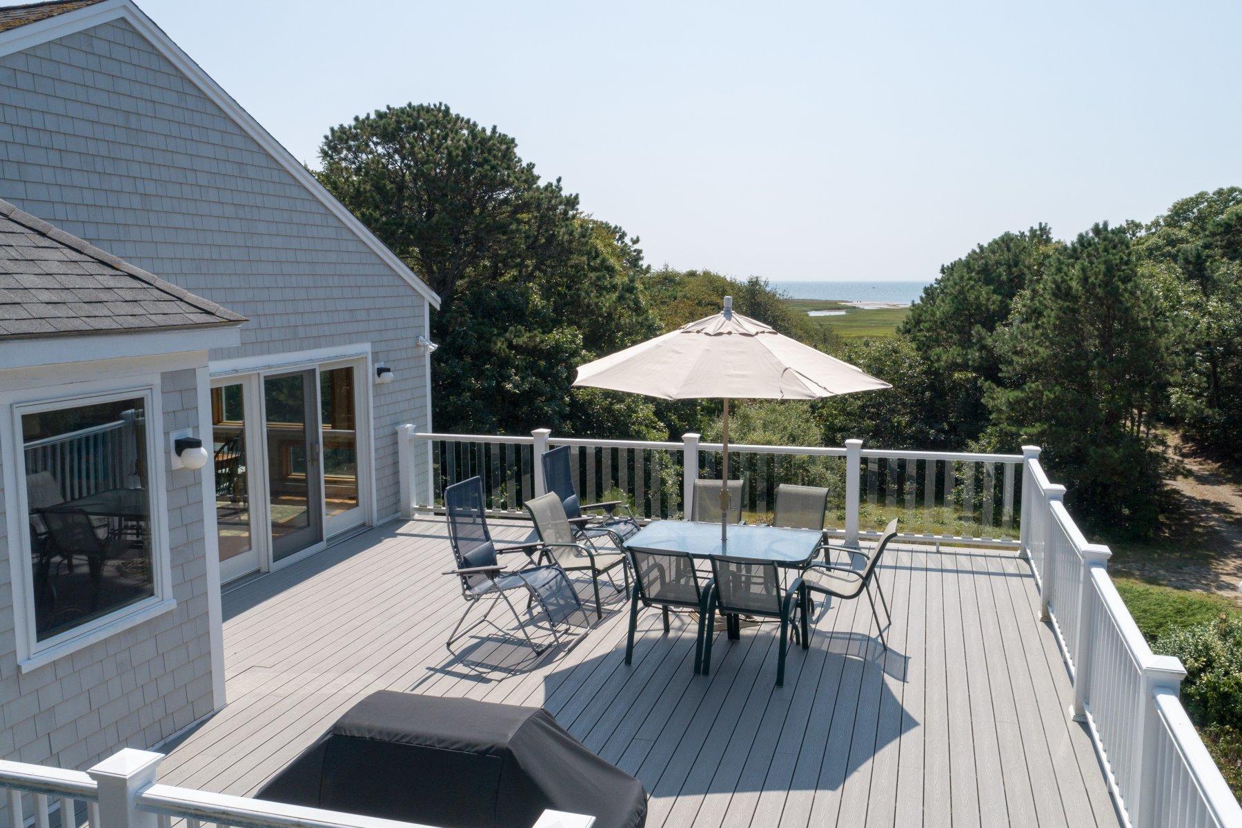20 South Chatham Road Harwich, MA 02645 - Photo 30 of 35 a view of house with patio outdoor seating and city view