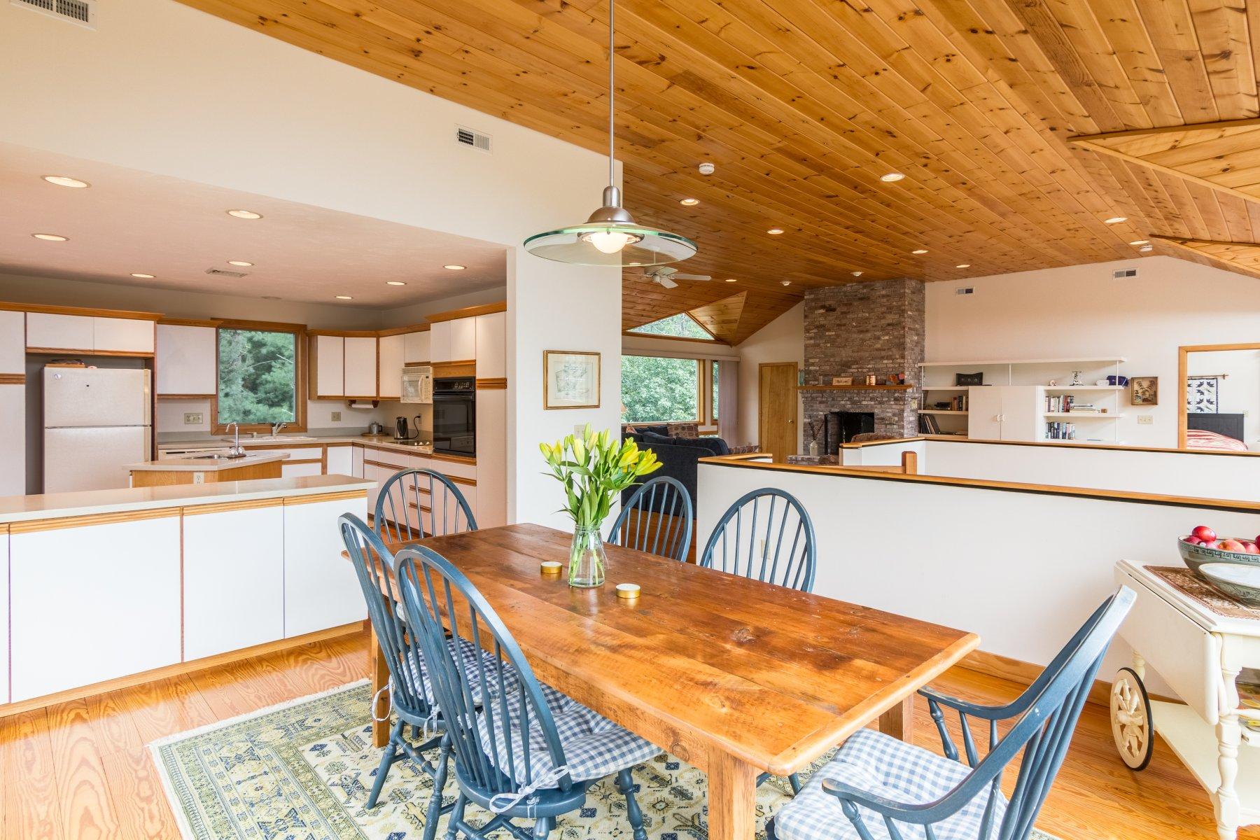 20 South Chatham Road Harwich, MA 02645 - Photo 35 of 35 a dining room with furniture and a floor to ceiling window