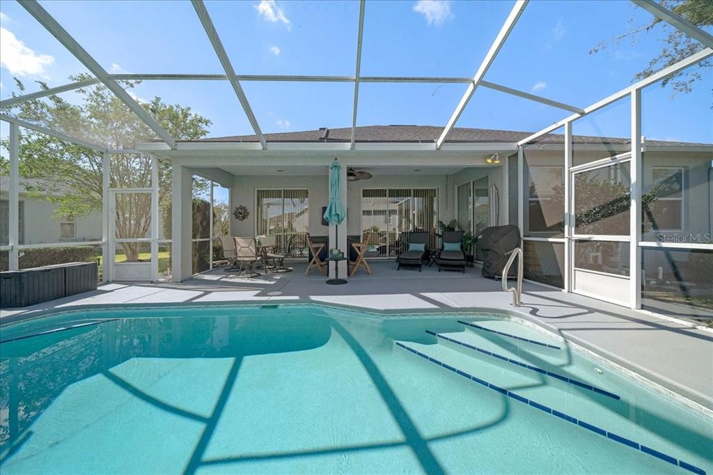 2197 Northwest 55th Avenue Road Ocala, FL 34482 - Photo 11 of 66 a view of a backyard of a house