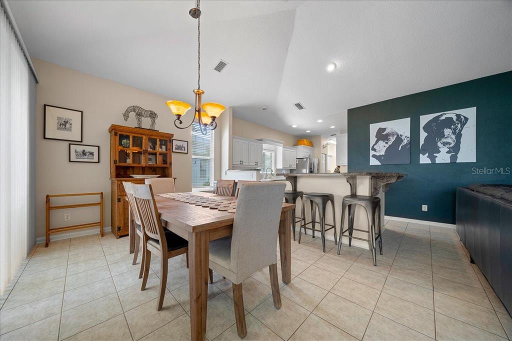 2197 Northwest 55th Avenue Road Ocala, FL 34482 - Photo 42 of 66 a view of a dining room with furniture